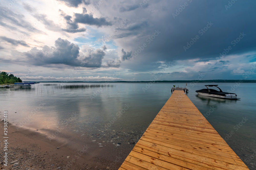 woodend dock on the lake with clouds