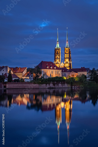 Cathedral of St. John the Baptist reflecting in Oder river, Wroclaw, Poland