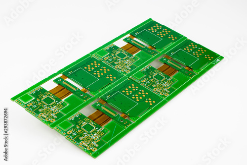 Multiplied printed circuit boards PCB isolated on the white background. PCB assembly.