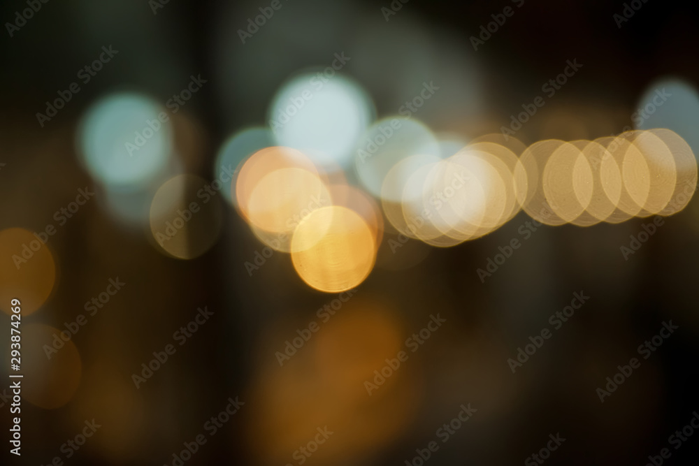 Fototapeta premium multi color bokeh light background . Bokeh light in the night road .colorful bokeh of city light at night, landscape background . Blur view of city traffic . black blure background