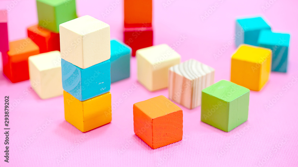 Colorful stack of wood cube building blocks Colorful stack of wood cube building blocks