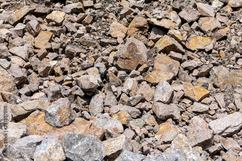 Stone granite Quarry. Rock texture background. Stone on the mountain nature background.