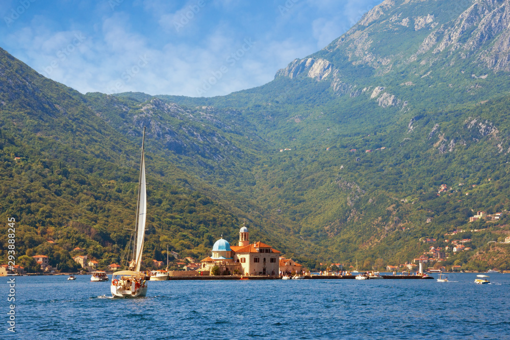View of Bay of Kotor and Island of Our Lady of the Rocks ( Gospa od Skrpjela ) on sunny autumn day. Montenegro
