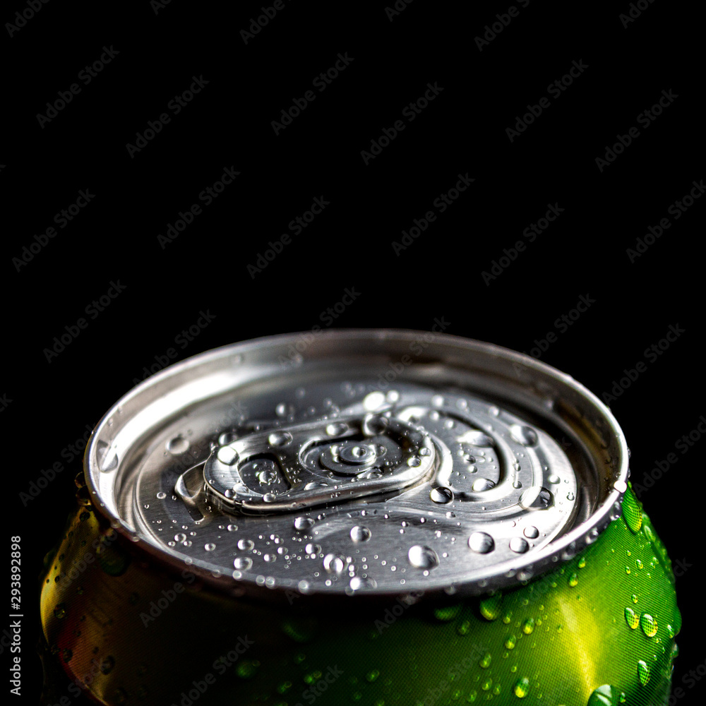 aluminum soda and beer beverage can with water droplets isolated on dark background, metal can, recyclable product aluminum soda and beer beverage can with water droplets isolated on dark background, metal can, recyclable product