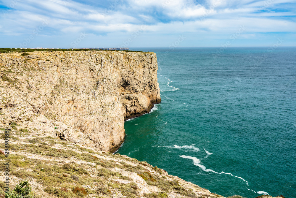 Spectacular cliffs overlooking the Atlantic Ocean at Cabo de Sao Vicente(Cape St. Vincent) .southwesternmost point of Portugal, Algarve Spectacular cliffs overlooking the Atlantic Ocean at Cabo de Sao Vicente(Cape St. Vincent) .southwesternmost point of Portugal, Algarve