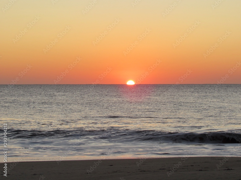 Sun rising on the horizon, Rehoboth Beach 