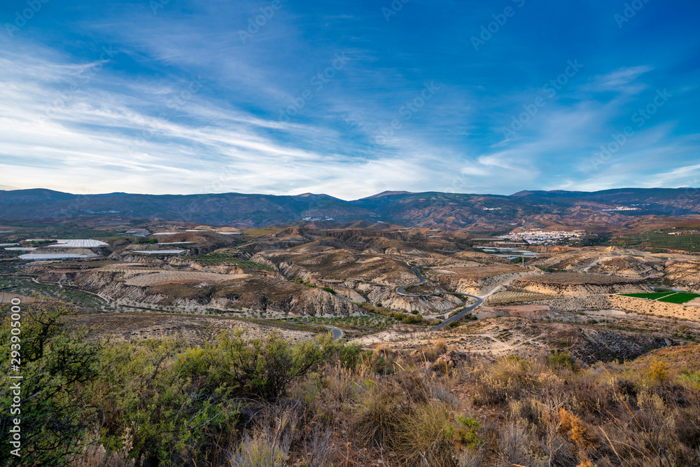 Panoramic photography of the Alpujarra with Sierra Nevada in the background.