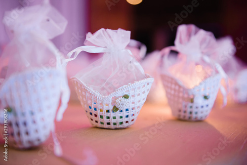 Fototapeta Naklejka Na Ścianę i Meble -  Candy wedding souvenirs on a table