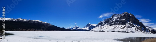 Bow Lake with mountain, ice and early meltwater © Creative Endeavors