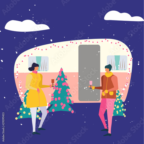 Young couple celebrating new year with decoration in camper.