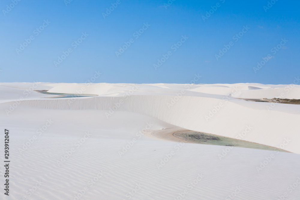 White sand dunes panorama from Lencois Maranhenses National Park, Brazil.