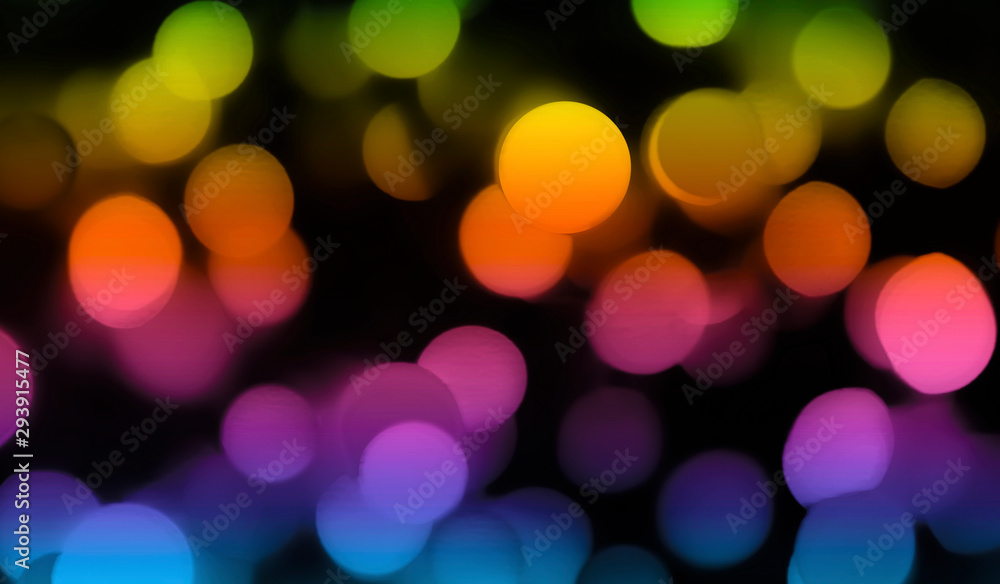 Multicolored defocused bokeh lights abstract on a dark background Multicolored defocused bokeh lights abstract on a dark background