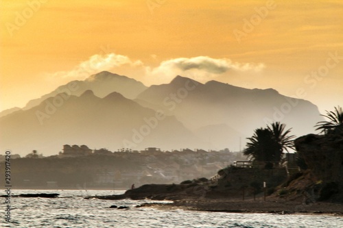 Sunset on Isla Plana beach in Cartagena, Murcia photo