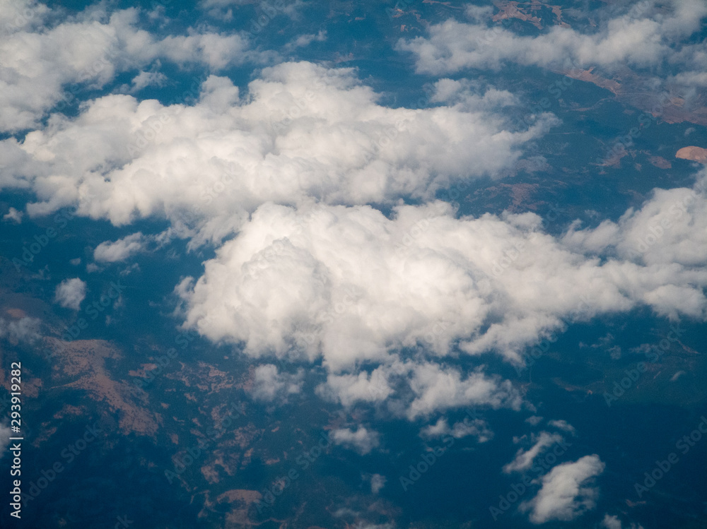 cloudscape land aerial view from airplane cloudscape land aerial view from airplane