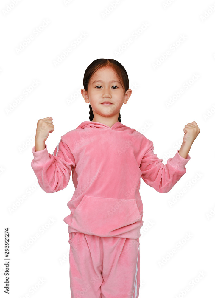 Portrait of beautiful little Asian child girl in pink tracksuit or sport cloth with fight stance over white background. Portrait half-length of kid girl. Confident concept. Portrait of beautiful little Asian child girl in pink tracksuit or sport cloth with fight stance over white background. Portrait half-length of kid girl. Confident concept.