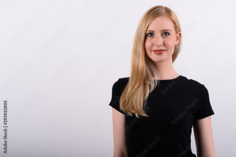 Young beautiful British woman with blond hair against white background Young beautiful British woman with blond hair against white background