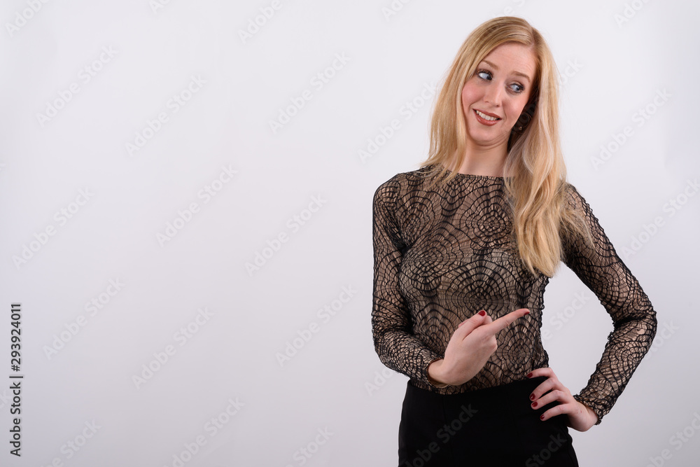 Young beautiful British woman with blond hair against white background Young beautiful British woman with blond hair against white background