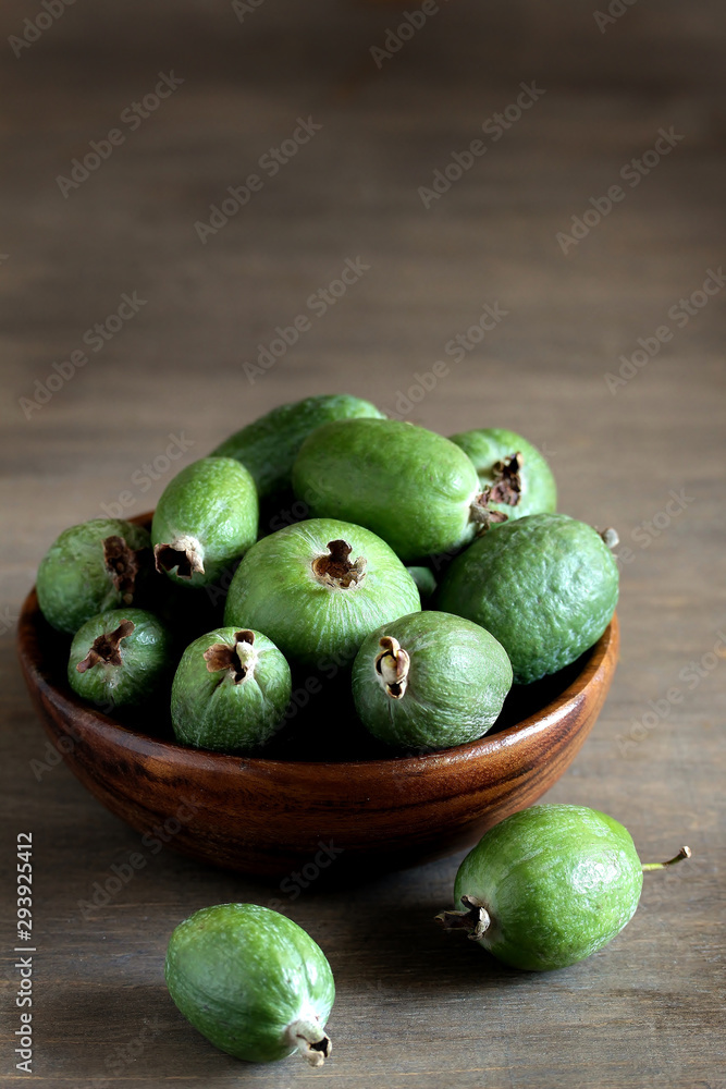 feijoa. berries of the guava family. grows in the tropics and subtropics. copy space feijoa. berries of the guava family. grows in the tropics and subtropics. copy space