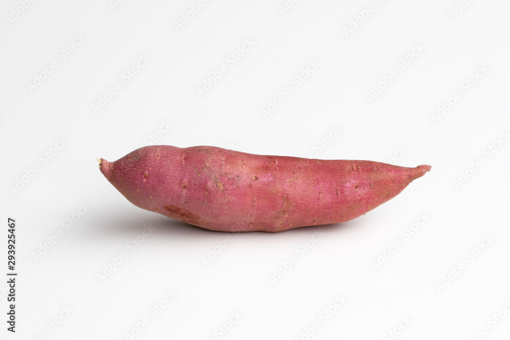 Single fresh Japanese yam centered and isolated on a white background.