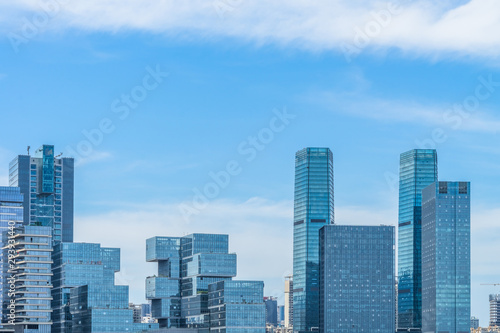 modern buildings complex against sky, shanghai, china. © hallojulie
