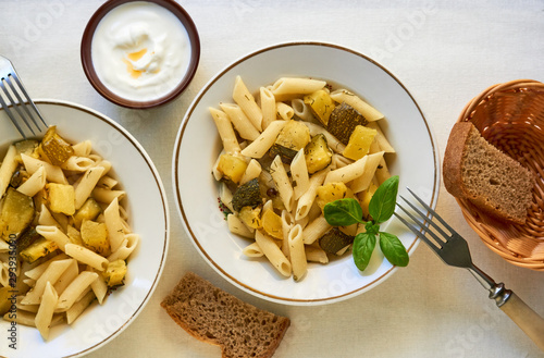 Penne pasta with fried zucchini
