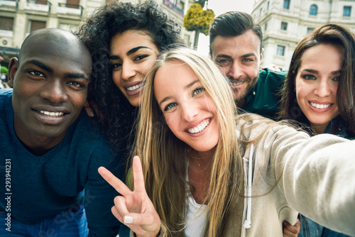 Multiracial group of young people taking selfie