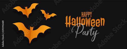 black halloween banner with yellow origami bats