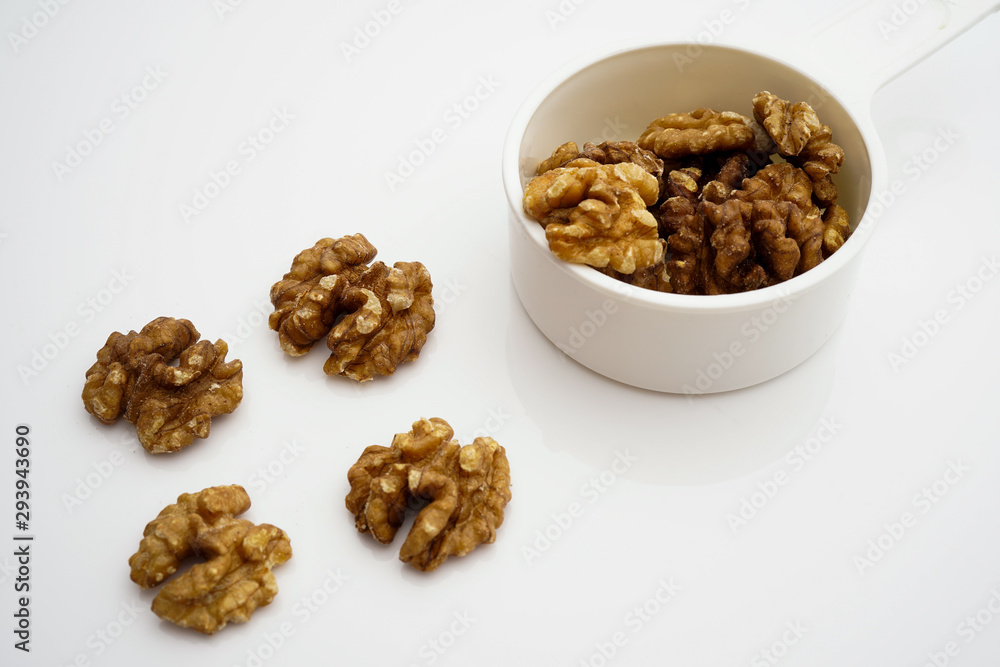 Walnut kernels isolated on white background Walnut kernels isolated on white background