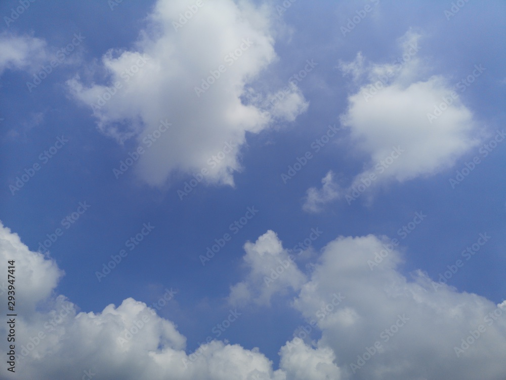 Fototapeta premium Stratocumulus white clouds in the blue sky natural background beautiful nature space for write 
