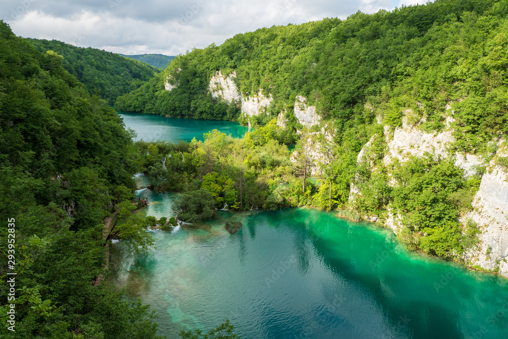 Milan's Lake and Gavan's Lake enclosed by the overgrown mountain slopes of the Lower Lakes Canyon at the Plitvice Lakes National Park in Croatia