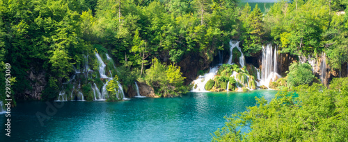 Rushing water from the Goat Lake cascades down the natural barriers into the Milan's Lake at the Plitvice Lakes National Park in Croatia