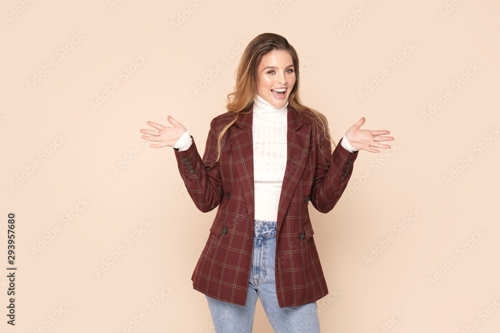 Friendly smiling woman posing in studio. Friendly smiling woman posing in studio.