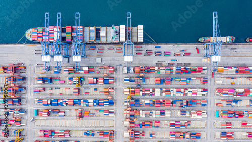 Top view of Deep water port with cargo ship and containers. It is an import and export cargo port where is a part of shipping dock and export products worldwide