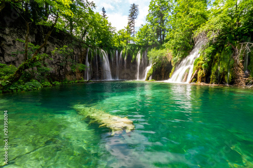 Pure fresh water rushing into an azure coloured lake at the Plitvice Lakes National Park  Plitvi  ka Jezera  Croatia