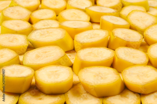 Fresh banana slices background. Top view.