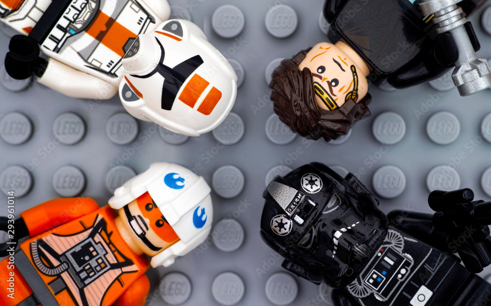 Naklejka premium Tambov, Russian Federation - July 06, 2016 Four Lego Star Wars minifigures - Anakin Skywalker, TIE Pilot, Zev Senesca and Republic Trooper - on Lego gray baseplate background. Studio shot.
