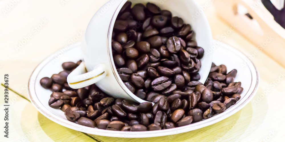 Fototapeta premium Raw roasted coffee beans in cotton sack.