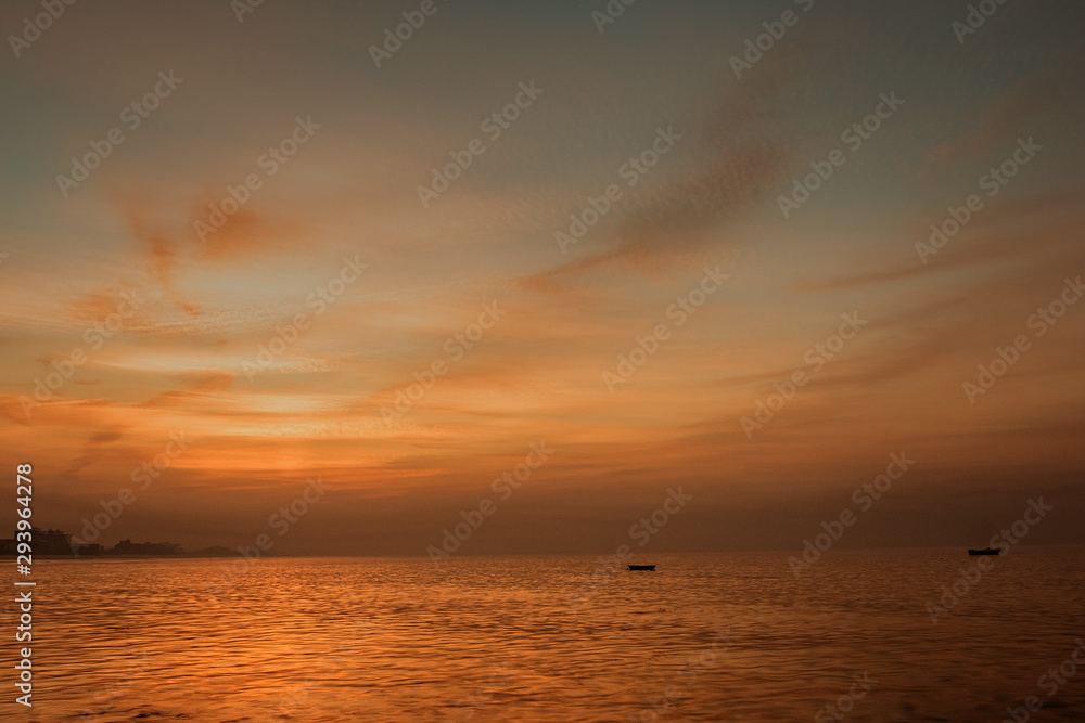 Sunrise and the empty boats at Hawksbay Karachi