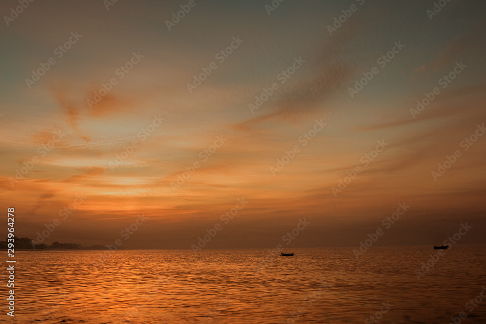 Sunrise and the empty boats at Hawksbay Karachi Sunrise and the empty boats at Hawksbay Karachi