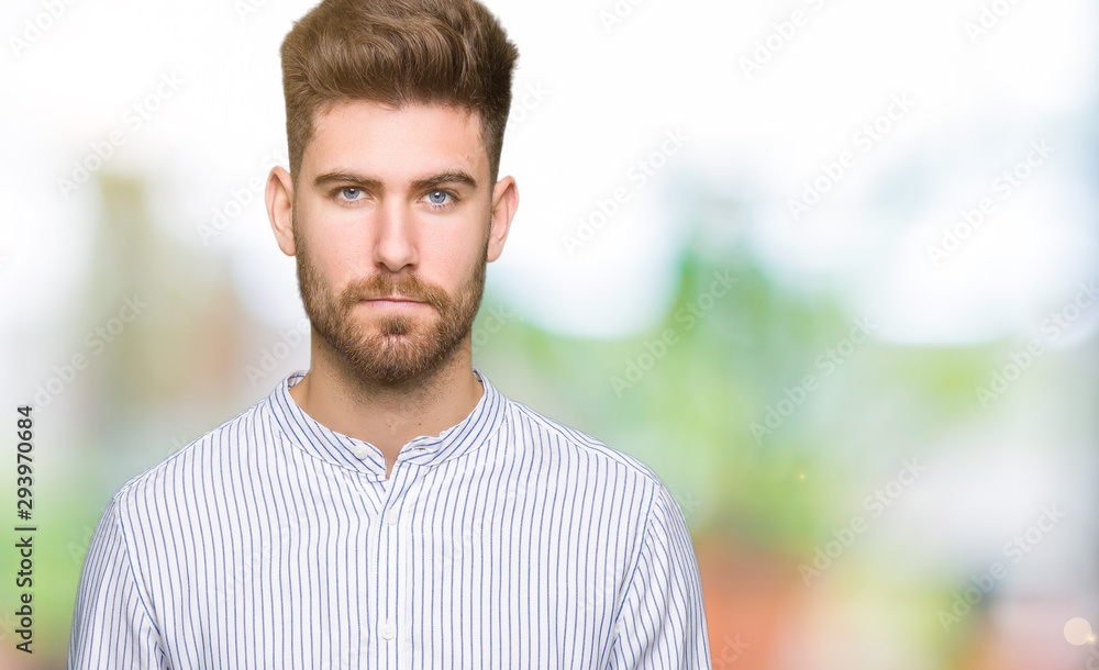 Young handsome man skeptic and nervous, frowning upset because of problem. Negative person. Young handsome man skeptic and nervous, frowning upset because of problem. Negative person.