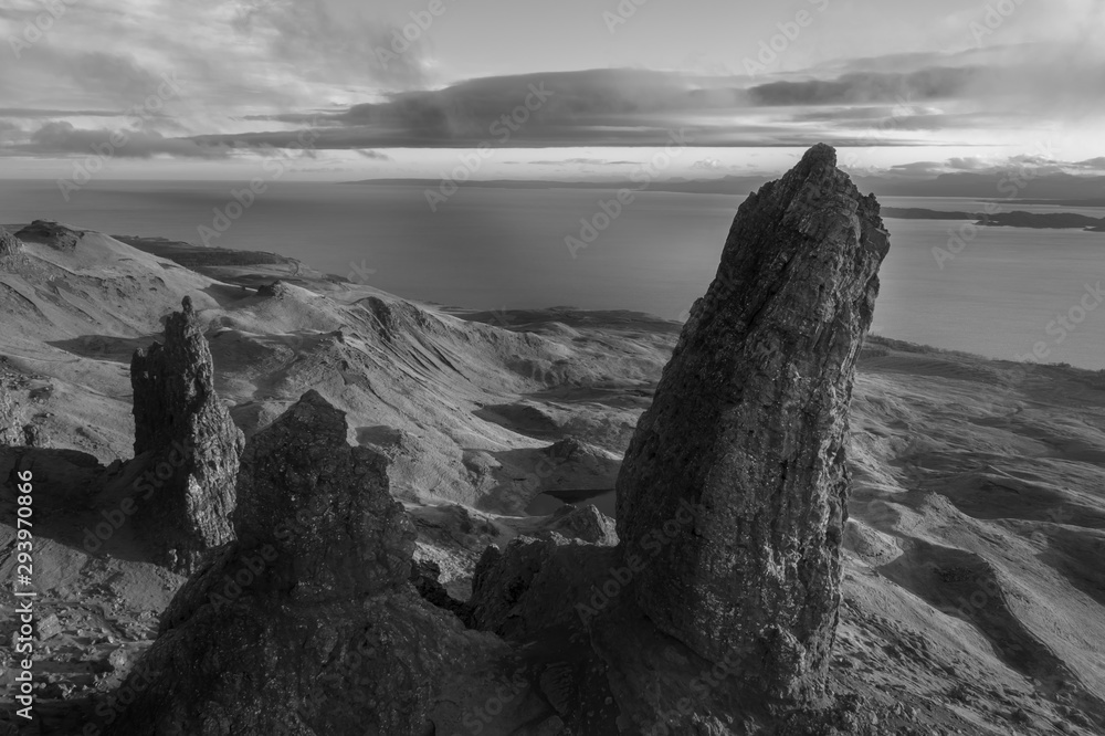 Isle of Skye black and white image with rocks, mountain and seascape