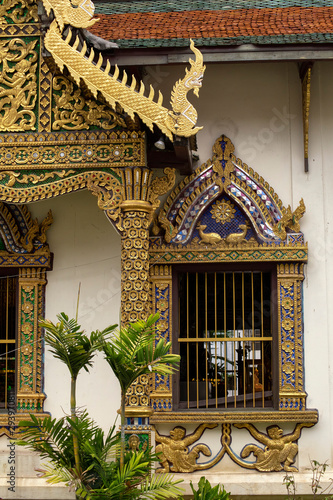Ornate windows in halll at Wat Chiang Man, Chiang Mai, Thailand