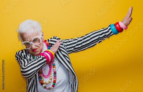 Funny grandmother portraits. Senior old woman dressing elegant for a special event. granny fashion model on colored backgrounds