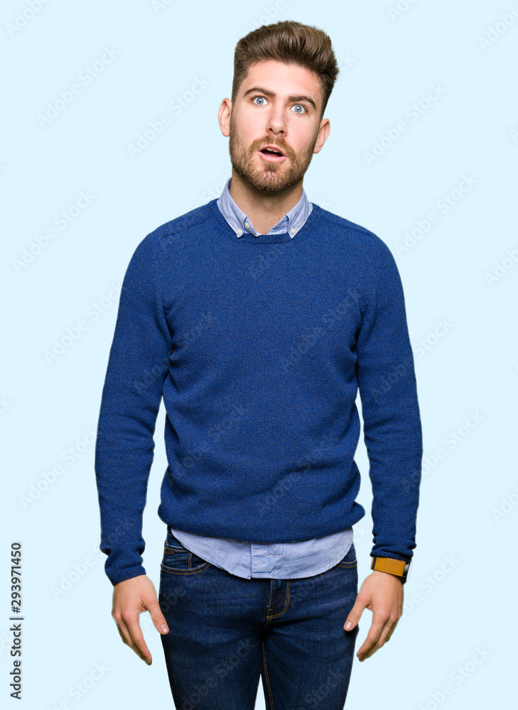 Young handsome bussines man In shock face, looking skeptical and sarcastic, surprised with open mouth Young handsome bussines man In shock face, looking skeptical and sarcastic, surprised with open mouth