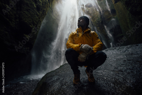 Man exploring iceland. Wanderlust explorer discovering icelandic natural wonders