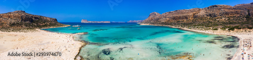 Amazing aerial panoramic view on the famous Balos beach in Balos lagoon and pirate island Gramvousa. Place of the confluence of three seas  Aegean  Adriatic  Libyan . 