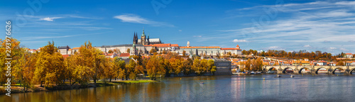 Prague, Czezh Republic. Scenic autumn aerial view of the Old Town with red foliage © daliu