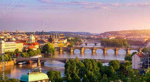 Charles Bridge, Prague, Czech Republic. Charles Bridge (Karluv Most) and Old Town Bridge Tower at sunset. Famous iconic image of Charles bridge. Concept of sightseeing and tourism. Czechia