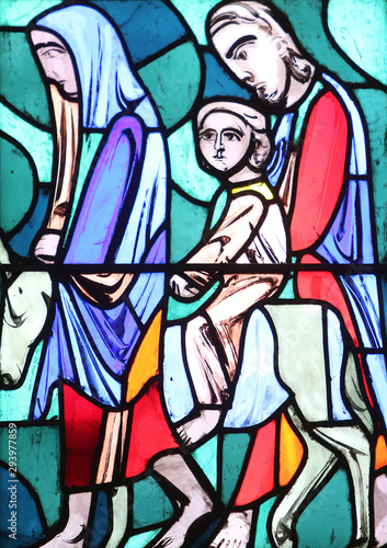 Flight into Egypt, stained glass window in Basilica of St. Vitus in Ellwangen, Germany