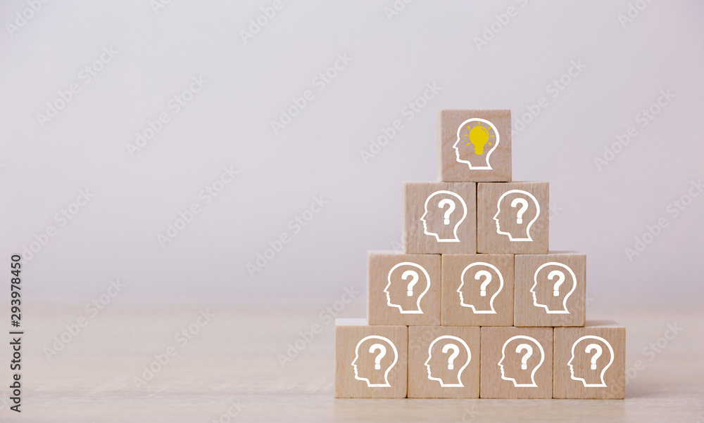 Arranging wood block stacking with icon head human symbol and light bulb,concept creative idea and innovation. Arranging wood block stacking with icon head human symbol and light bulb,concept creative idea and innovation.